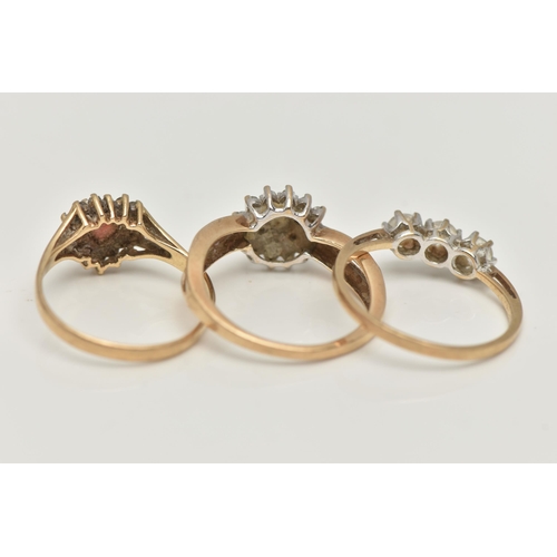 37 - THREE 9CT GOLD RINGS, the first a circular diamond cluster ring, with open work single cut diamond s... 