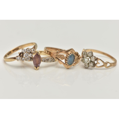 40 - FOUR 9CT GOLD RINGS, to include a marquise cut amethyst and diamond ring, polished band, hallmarked ... 