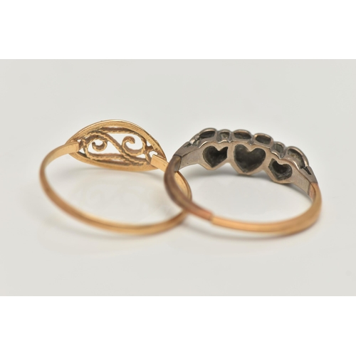 41 - TWO YELLOW METAL RINGS, the first set with three single cut diamonds illusion set in heart shape whi... 