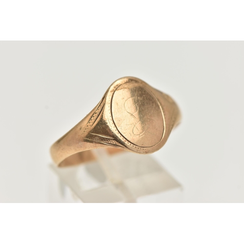 50 - A 9CT YELLOW GOLD SIGNET RING, of an oval form, worn engraving, misshapen shank, hallmarked 9ct Birm... 