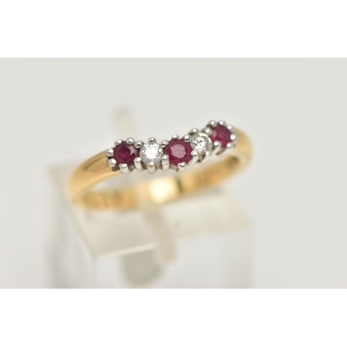 6 - AN 18CT GOLD RUBY AND DIAMOND WISHBONE RING, set with three circular cut rubies, interspaced with tw... 