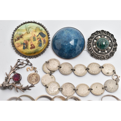 61 - A BAG OF ASSORTED JEWELLERY, to include a large blue cabochon stone brooch, mounted in a white metal... 