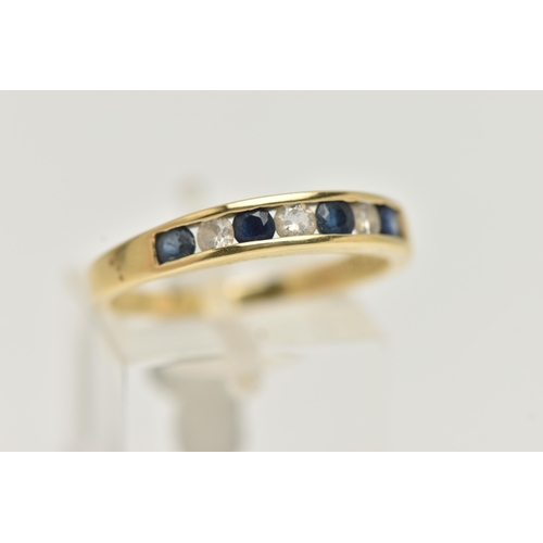 7 - AN 18CT GOLD SAPPHIRE AND DIAMOND HALF ETERNITY RING, set with four deep blue circular cut sapphires... 