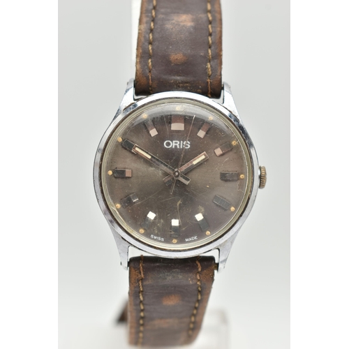 82 - TWO GENTS WRISTWATCHES, the first a manual wind 'Oris', round grey dial, baton markers, in a polishe... 