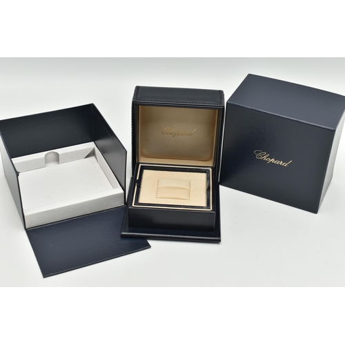 86 - A CHOPARD RING BOX, a blue leather box embossed signed 'Chopard' together with outer box signed 'Cho... 