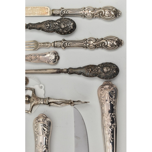 102 - A SELECTION OF SILVERWARE, to include a childrens silver knife and fork set, engraved detail to the ... 