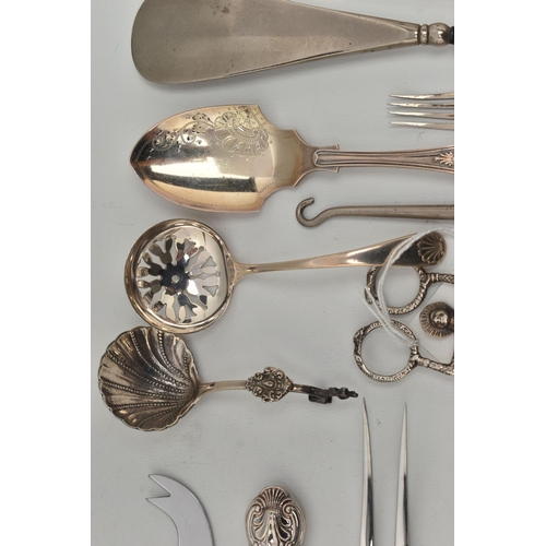 102 - A SELECTION OF SILVERWARE, to include a childrens silver knife and fork set, engraved detail to the ... 