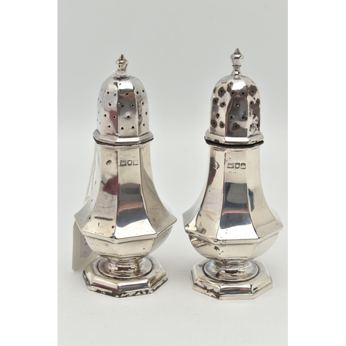 104 - A PAIR OF CASED LATE VICTORIAN SALT AND PEPPER SHAKERS, a pair of octagonal baluster silver salt and... 