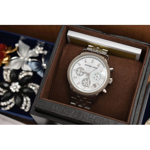 120 - A SELECTION OF MAINLY COSTUME JEWELLERY AND WATCHES, to include a stainless steel Michael Kors wrist... 