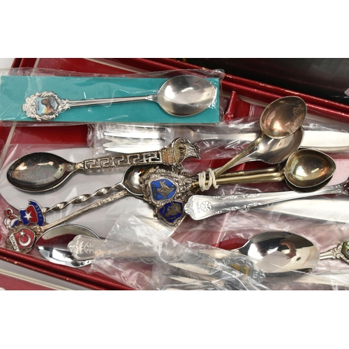 124 - AN ASSORTMENT OF SOUVENIER PINS AND SPOONS, a large selection of grip pins for an number of countrie... 