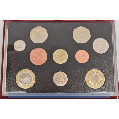 141 - A BOX LID CONTAINING UK 2003, 2004 PROOF COIN YEAR SETS IN DELUX CASES (2)