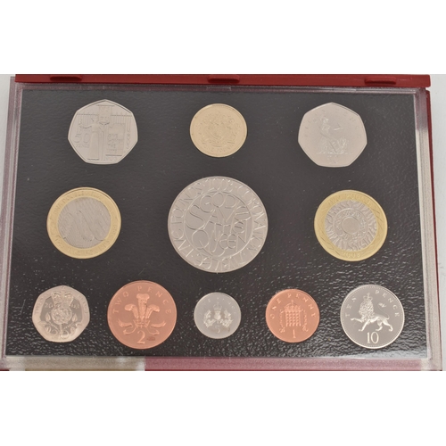 141 - A BOX LID CONTAINING UK 2003, 2004 PROOF COIN YEAR SETS IN DELUX CASES (2)