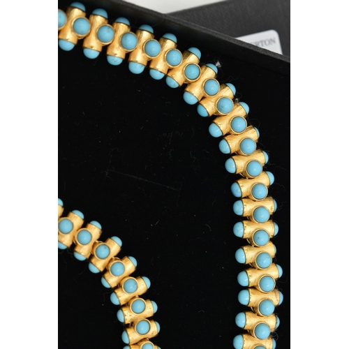 90 - A MODERN SNAKE PENDANT NECKLACE, gold plated articulated snake set with imitation turquoise cabochon... 