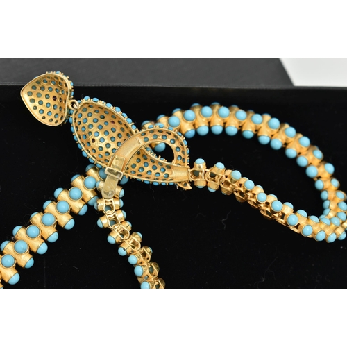 90 - A MODERN SNAKE PENDANT NECKLACE, gold plated articulated snake set with imitation turquoise cabochon... 