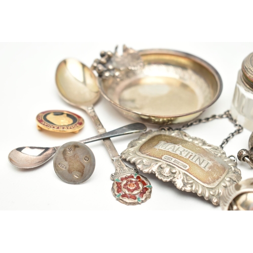 96 - AN ASSORTMENT OF SILVER ITEMS, to include a pair of wishbone sugar tongs, hallmarked 'James Swann & ... 