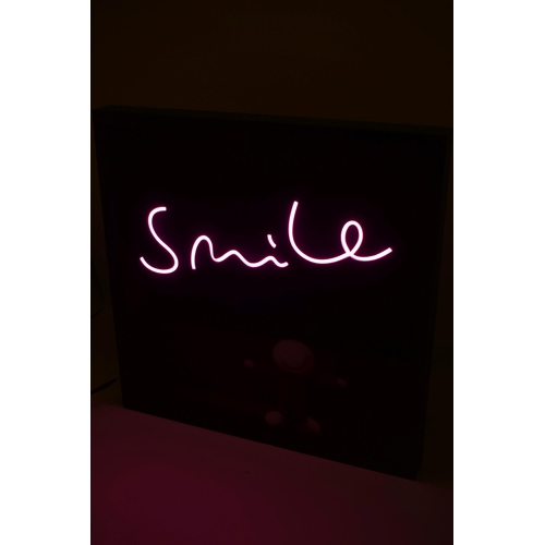 313 - DOUG HYDE ( BRITISH 1972) 'KEEP SMILING', a LED mixed media print, 107/195 with certificate, pink LE... 