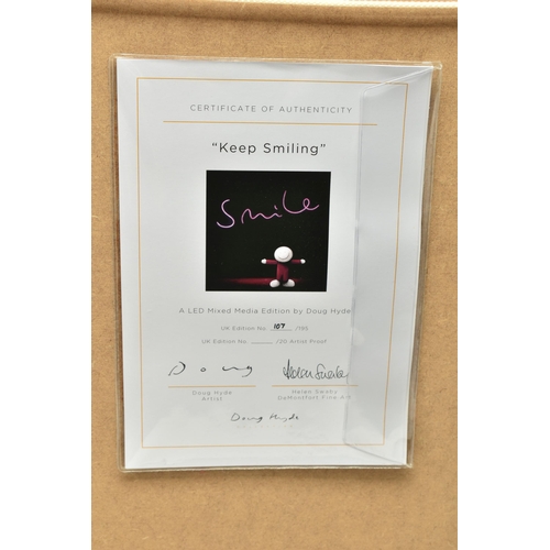 313 - DOUG HYDE ( BRITISH 1972) 'KEEP SMILING', a LED mixed media print, 107/195 with certificate, pink LE... 