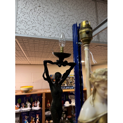 420 - A GROUP OF CLOCKS AND FIGURAL LAMP BASES, comprising a pocket watch and stand, the continental pocke... 