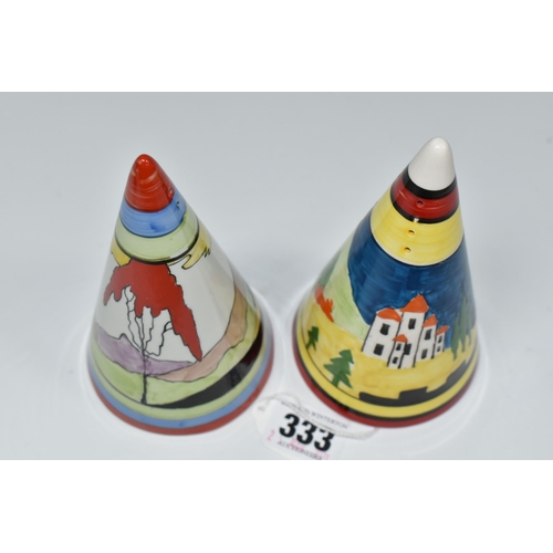 333 - TWO RENE DALE CONICAL SUGAR SHAKERS, one painted with a castle amongst trees and hills, the other wi... 