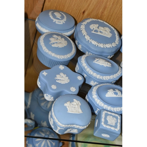 335 - A COLLECTION OF WEDGWOOD JASPERWARE TRINKET BOXES AND COVERED POTS, fifteen pale blue pieces in diff... 