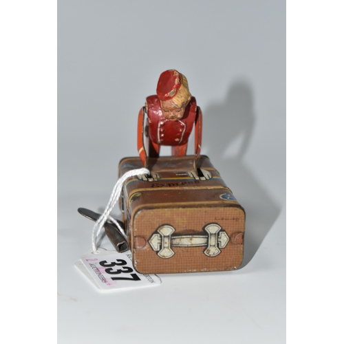 337 - A GESCHA TIN PLATE 'EXPRESS BOY' CLOCKWORK TOY, the boy wearing a red uniform, pushing a trunk, mark... 