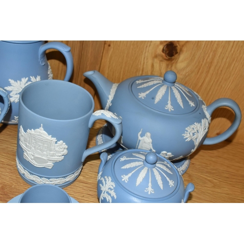 338 - A COLLECTION OF WEDGWOOD JASPERWARE TEA WARE, eleven pale blue pieces, comprising a teapot and stand... 