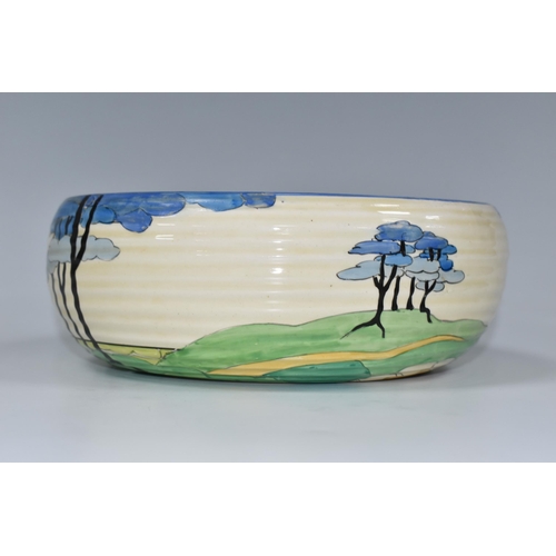 339 - A CLARICE CLIFF 'BLUE FIRS' PATTERN 632 BOWL, painted with stylised blue fir trees in a landscape, w... 