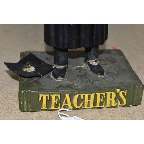 357 - A TEACHER'S SCOTCH WHISKY ADVERTISING FIGURE, the Ruberoid figure in the form of a teacher in cap an... 