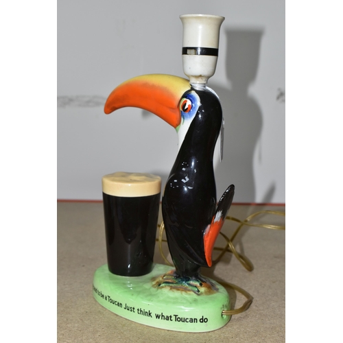 358 - A HAND PAINTED CARLTON WARE GUINNESS ADVERTISING 'TOUCAN' TABLE LAMP, a mid-20th century Guinness pr... 