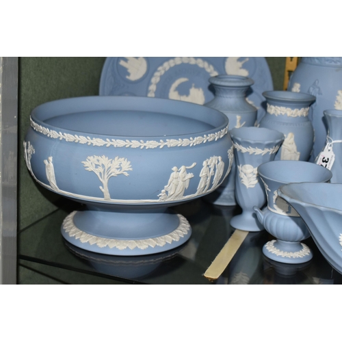 372 - A COLLECTION OF WEDGWOOD JASPERWARE GIFT WARE, fourteen pale blue pieces including vases - tallest 1... 