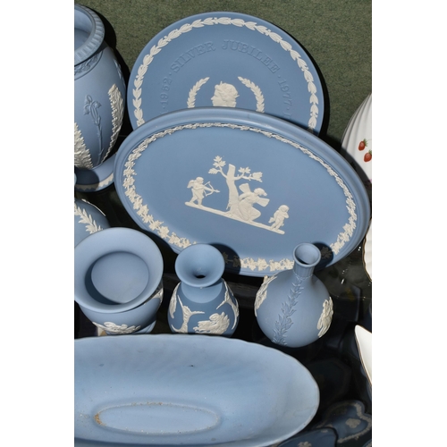 372 - A COLLECTION OF WEDGWOOD JASPERWARE GIFT WARE, fourteen pale blue pieces including vases - tallest 1... 