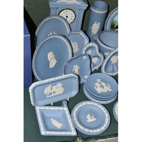 375 - A GROUP OF WEDGWOOD JASPERWARE GIFT WARE, over forty pieces in mostly pale blue, to include a mantel... 