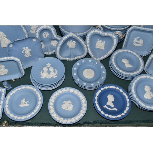 375 - A GROUP OF WEDGWOOD JASPERWARE GIFT WARE, over forty pieces in mostly pale blue, to include a mantel... 