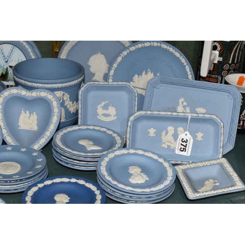 375 - A GROUP OF WEDGWOOD JASPERWARE GIFT WARE, over forty pieces in mostly pale blue, to include a mantel... 