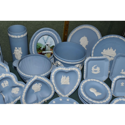 375 - A GROUP OF WEDGWOOD JASPERWARE GIFT WARE, over forty pieces in mostly pale blue, to include a mantel... 