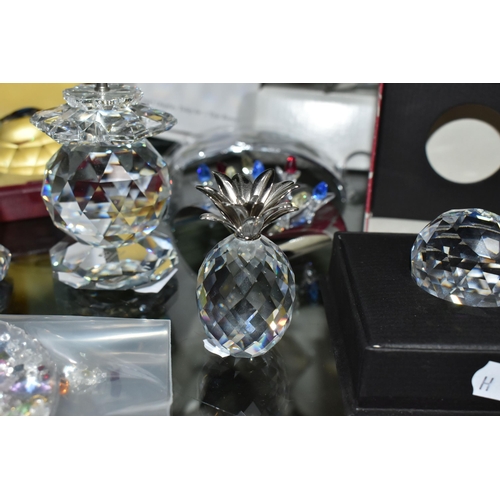 376 - A COLLECTION OF SWAROVSKI CRYSTAL, comprising a boxed Tigger from the Winnie the Pooh Disney series,... 