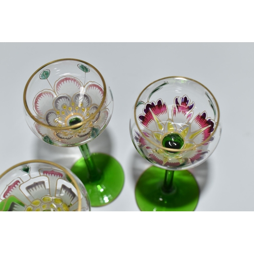 378 - SIX LIQUEUR GLASSES IN THE MANNER OF THERESIENTHAL, comprising six flower form glasses of four diffe... 