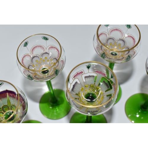 378 - SIX LIQUEUR GLASSES IN THE MANNER OF THERESIENTHAL, comprising six flower form glasses of four diffe... 