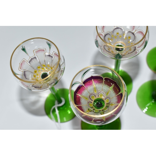 378 - SIX LIQUEUR GLASSES IN THE MANNER OF THERESIENTHAL, comprising six flower form glasses of four diffe... 