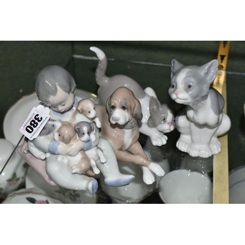 380 - THREE LLADRO FIGURES, comprising New Playmates model number 5456, depicting a boy, dog and puppies, ... 