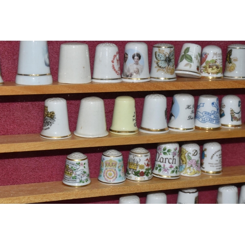 385 - A COLLECTION OF THIMBLES AND CERAMICS, to include approximately one hundred and fifty thimbles, incl... 