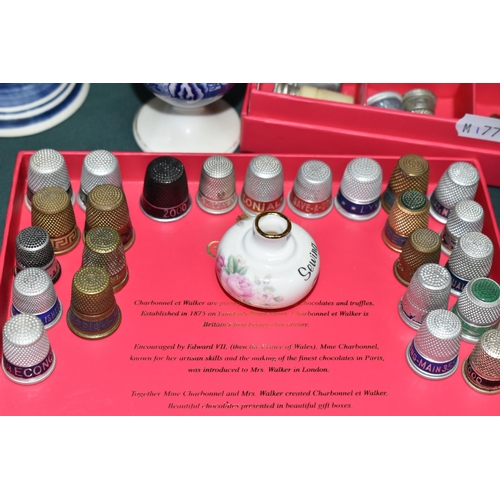 385 - A COLLECTION OF THIMBLES AND CERAMICS, to include approximately one hundred and fifty thimbles, incl... 