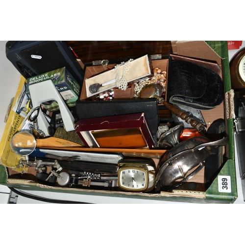 389 - A BOX AND LOOSE MISCELLANEOUS ITEMS, to include an Anglia Dunlop tyre desk lighter, a jewellery box ... 