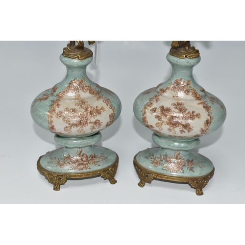 393 - A PAIR OF REPRODUCTION TURQUOISE PORCELAIN AND BRASS FIGURAL CANDLEHOLDERS OF LATE 19TH CENTURY STYL... 