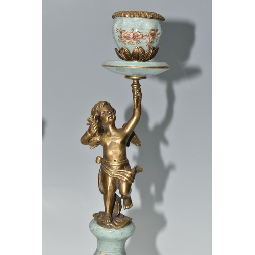 393 - A PAIR OF REPRODUCTION TURQUOISE PORCELAIN AND BRASS FIGURAL CANDLEHOLDERS OF LATE 19TH CENTURY STYL... 