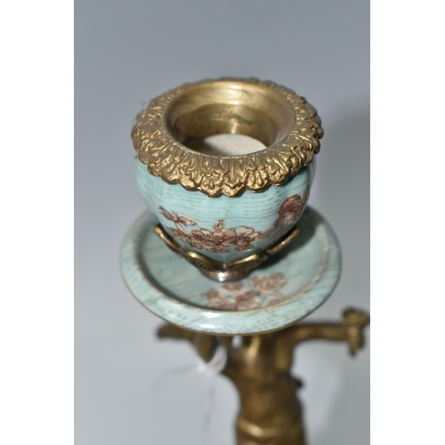 393 - A PAIR OF REPRODUCTION TURQUOISE PORCELAIN AND BRASS FIGURAL CANDLEHOLDERS OF LATE 19TH CENTURY STYL... 