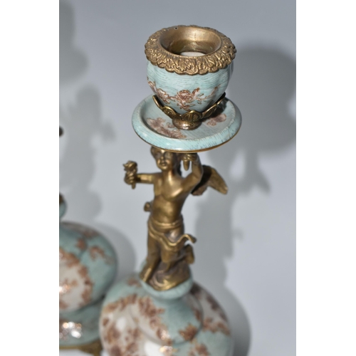 393 - A PAIR OF REPRODUCTION TURQUOISE PORCELAIN AND BRASS FIGURAL CANDLEHOLDERS OF LATE 19TH CENTURY STYL... 