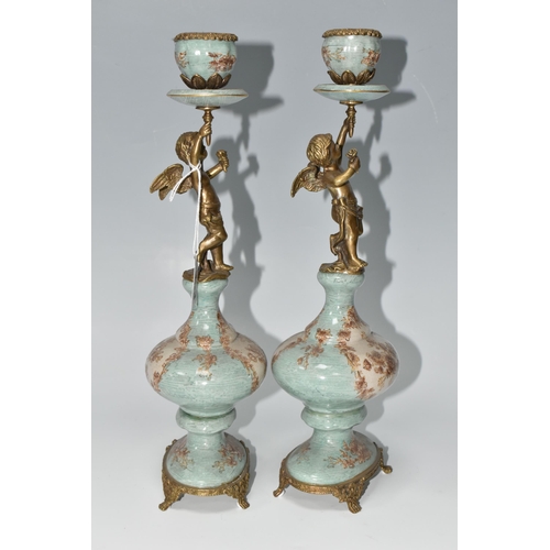 393 - A PAIR OF REPRODUCTION TURQUOISE PORCELAIN AND BRASS FIGURAL CANDLEHOLDERS OF LATE 19TH CENTURY STYL... 