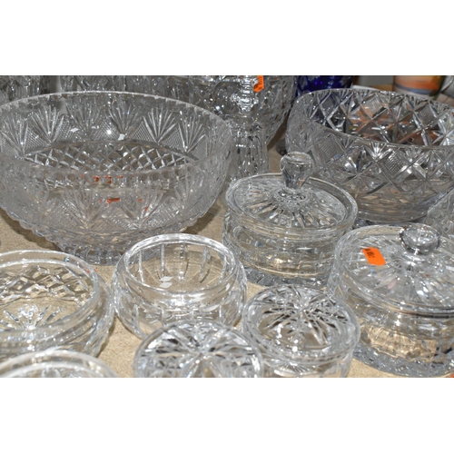 395 - A QUANTITY OF CUT CRYSTAL BOWLS AND VASES, comprising Stuart Crystal trinket boxes, five fruit bowls... 