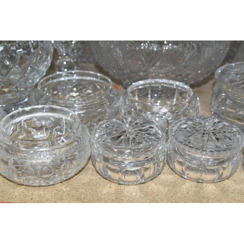 395 - A QUANTITY OF CUT CRYSTAL BOWLS AND VASES, comprising Stuart Crystal trinket boxes, five fruit bowls... 